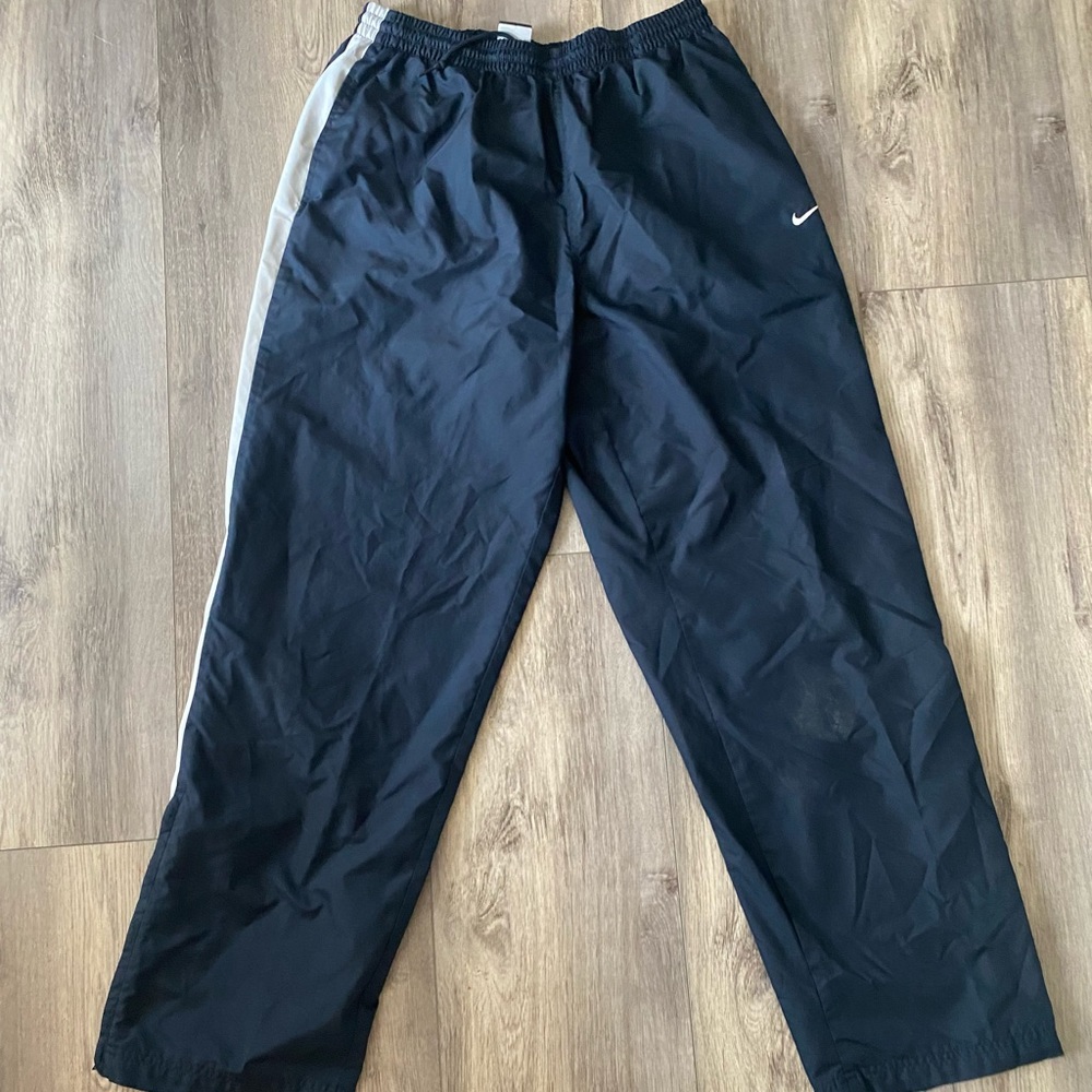 Nike Navy track pants with white stripe size large